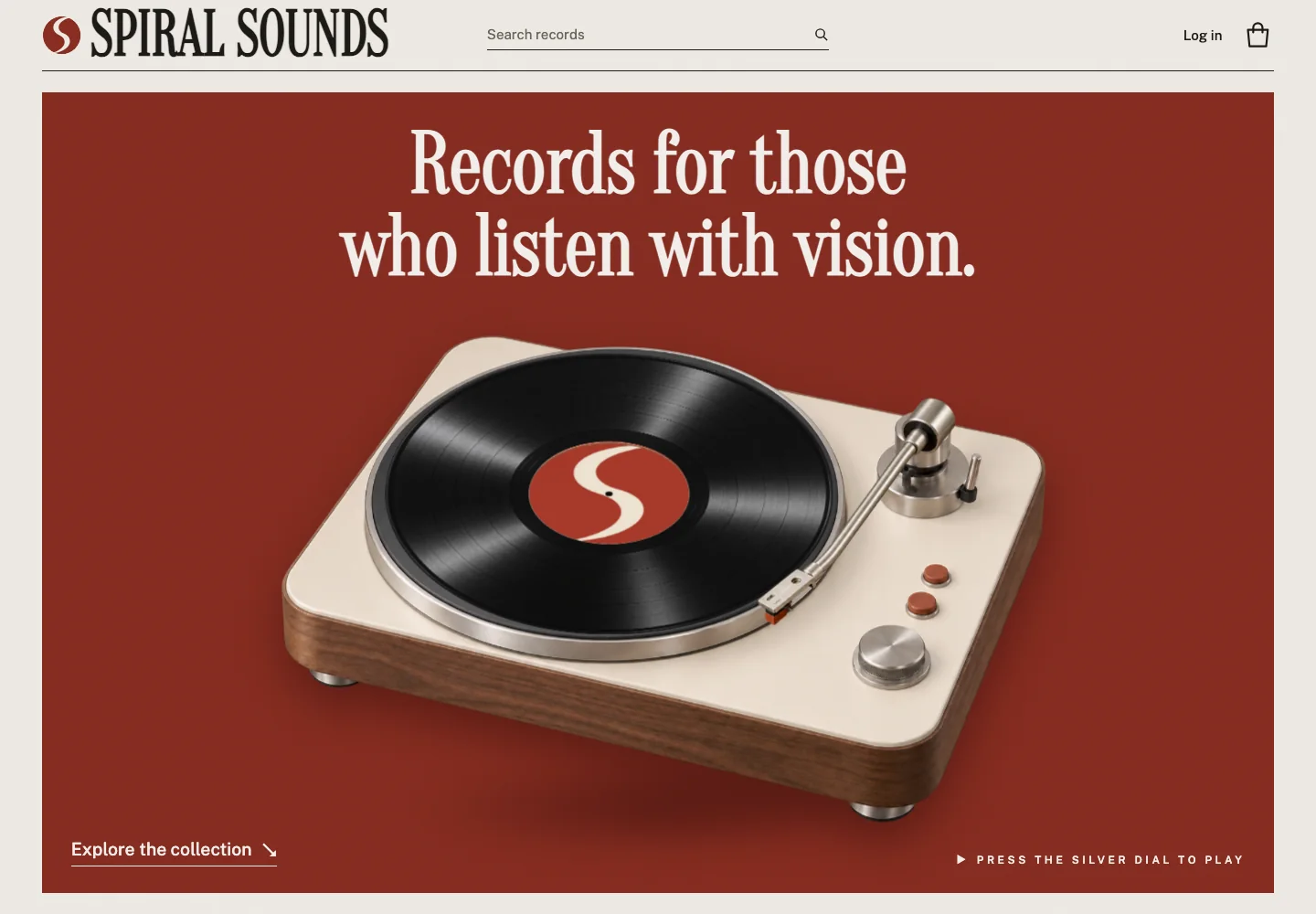 Spiral Sounds homepage with an interactive walnut turntable beneath the editorial headline